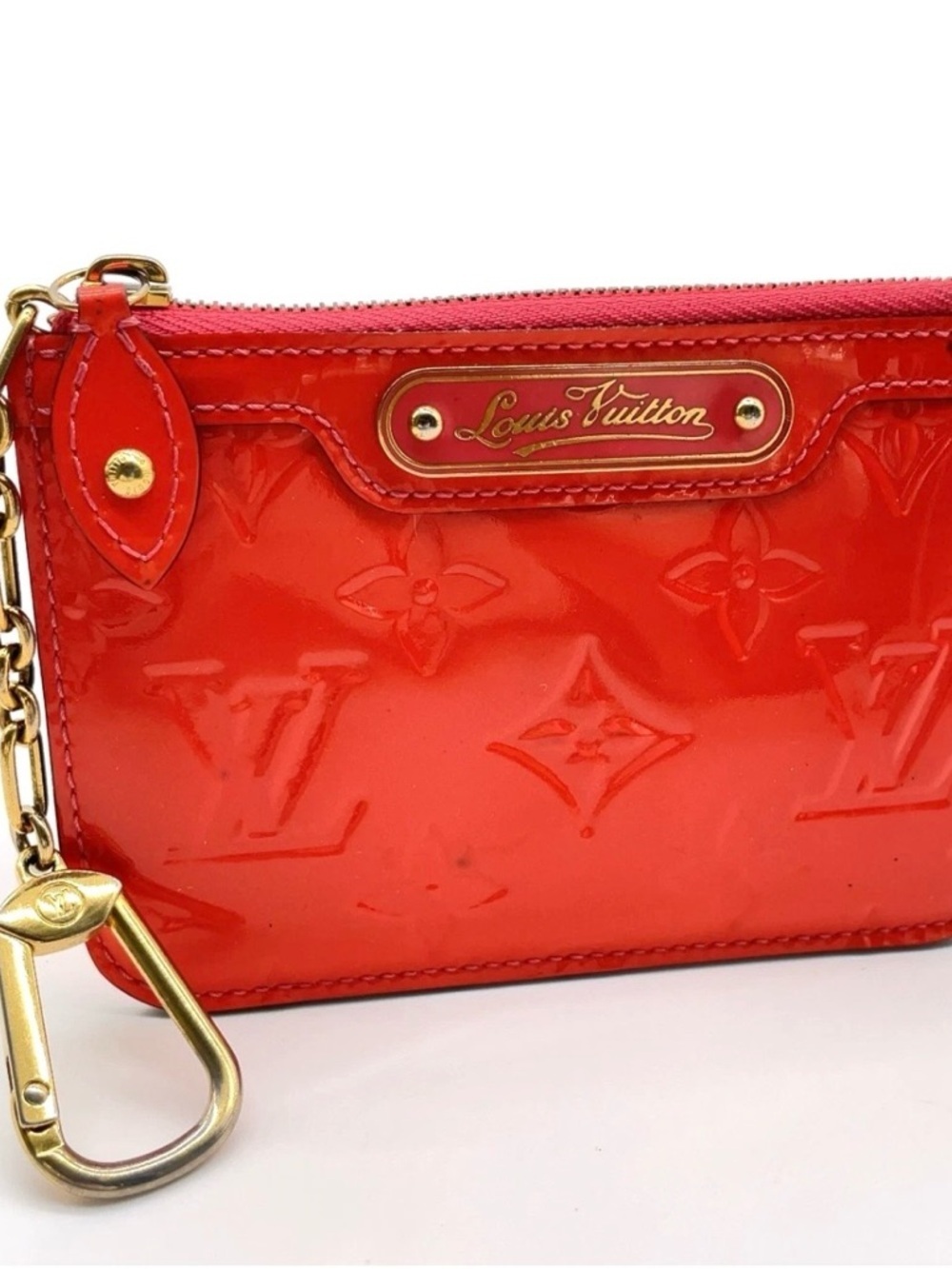 Auth Louis Vuitton Monogram Vernis
Pochette Clé Orange Sunset